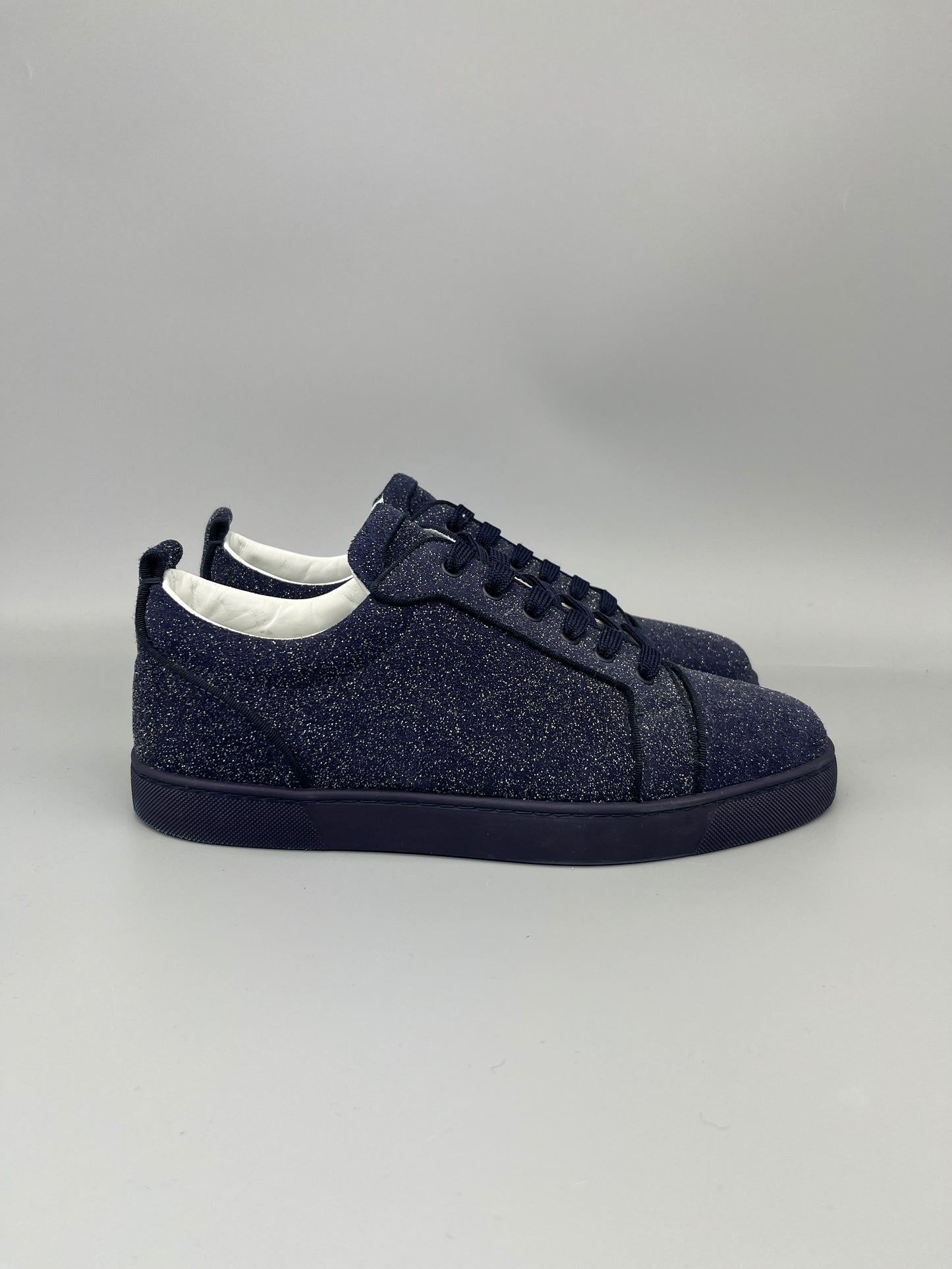 Christian Louboutin Louis Junior Glitter Sneaker in navy – Guaranteed authentic from The Grand Archive.