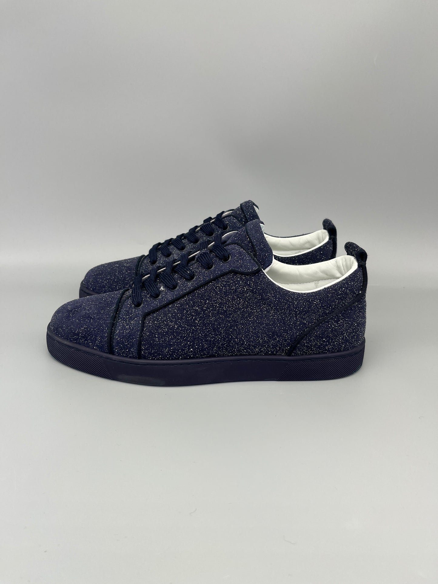 Christian Louboutin Louis Junior Glitter Sneaker in navy – Guaranteed authentic from The Grand Archive.