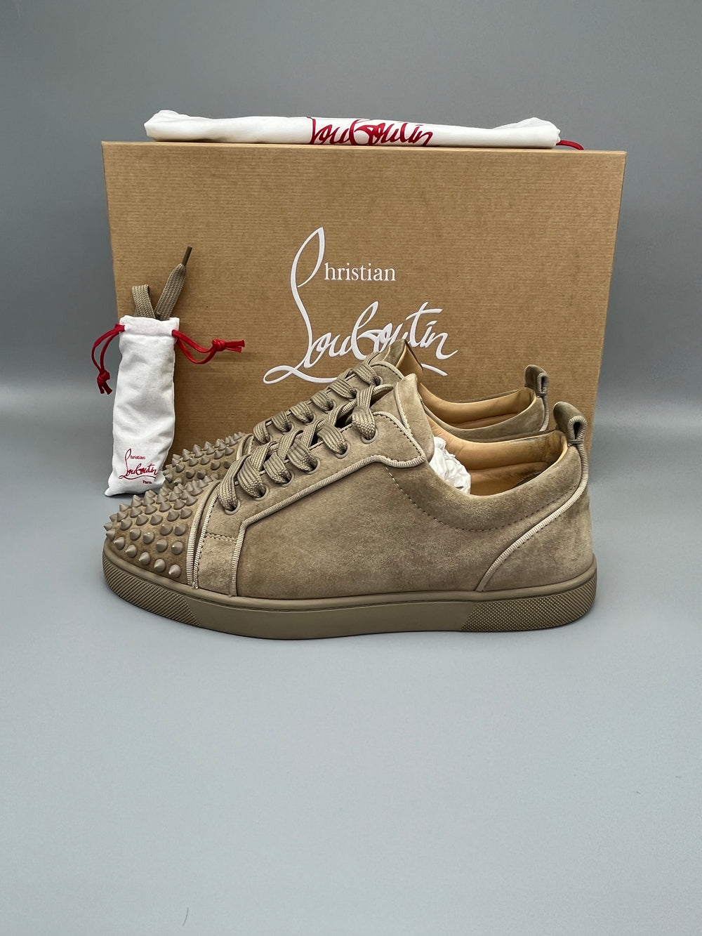 Christian Louboutin Louis Junior Spikes Orlato suede sneaker in beige