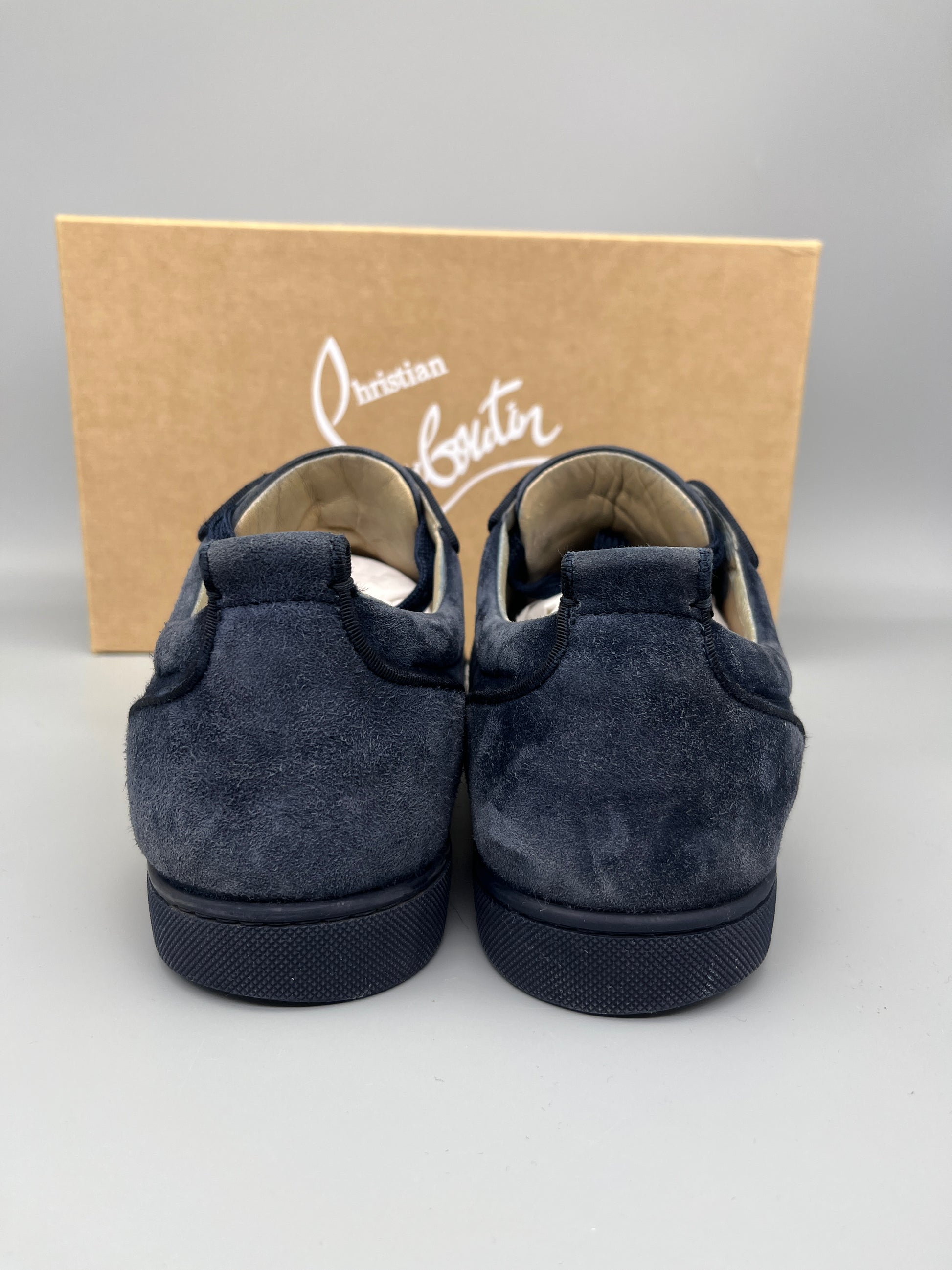Christian Louboutin Louis Junior Spikes Suede Sneaker in navy – Guaranteed authentic from The Grand Archive.